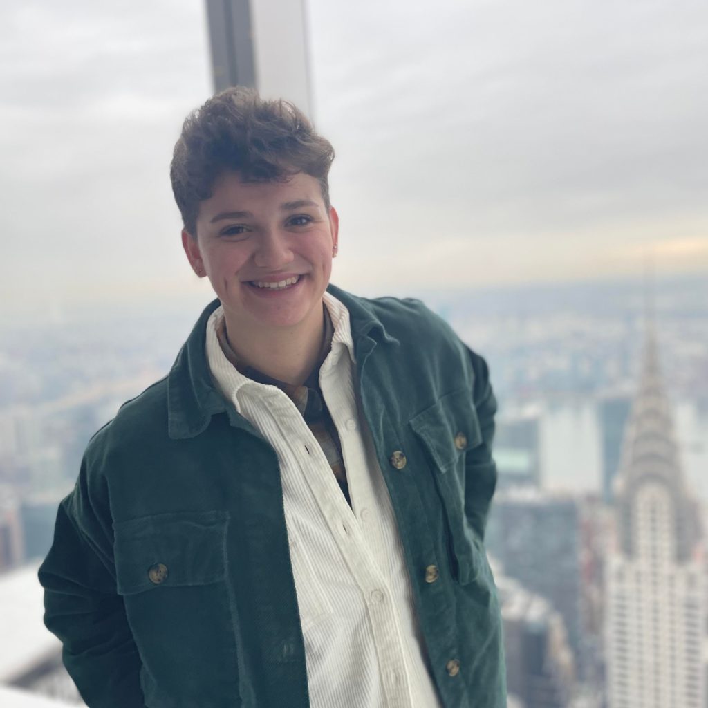 Image of my self on the top of the rock in New York with central park in the back