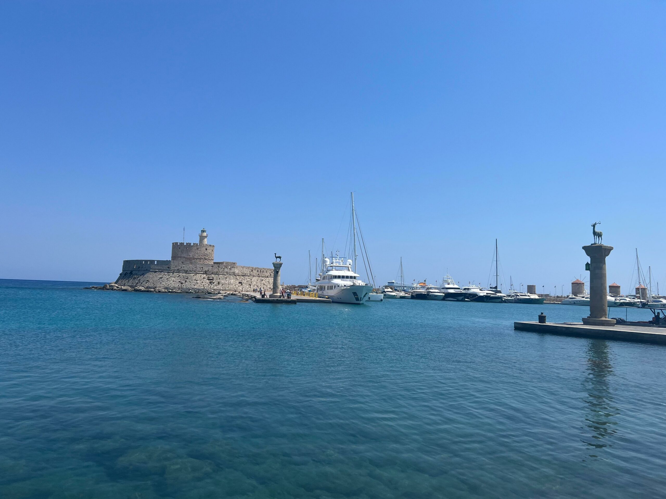 Mandraki Port is a lovely place for a walk. It’s known as the spot where the famous Colossus of Rhodes once stood. While the statue is no longer there, you can still see where it was believed to have been placed, guarding the entrance to the port.